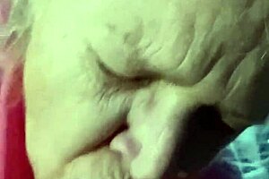 This hot milf surprises by just sucking on that big monster cock in intriguing close-up.