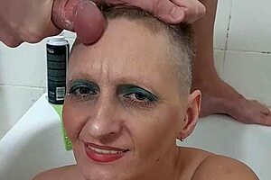 Watch out! German MILF Sandra gets cum all over her face in explosive cumshot!