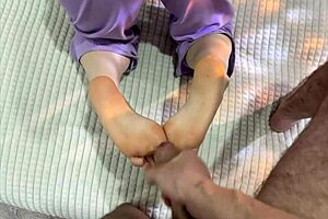 the stepmother showed off her fresh pedicure and gave her stepson a thrilling footjob in the bedroom