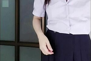 This teen girl next door in her student uniform films a steamy clip, trading her seductive moves for some quick cash