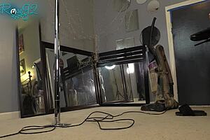 She vacuums the house while strutting in those tight hobble boots as a milf housewife.