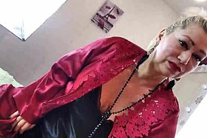 Look at this mature slut wife in red satin negligee sucking dick with ponytail