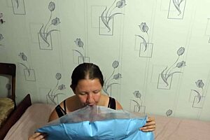 Milf engages in looner fetish by inflating beach circle