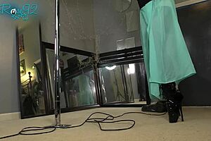 She vacuums the house while strutting in those tight hobble boots as a milf housewife.