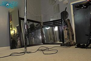 She vacuums the house while strutting in those tight hobble boots as a milf housewife.