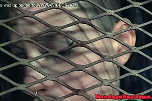 Bdsm redhead sub gets nipples clamped and toyed in close up.