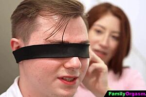 hey, check out this redhead girlfriend and her mom setting up a blindfold surprise for the new boyfriend in a wild family orgasm scene