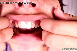 She explored her mouth fetish up close while gagged in that intense session