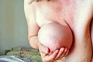 Mature stepmother with huge breasts feeds stepson but enjoys more than expected