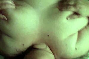 milf plays with pussy in bathtub then sucks step son's cock deep. she climbs on top for cum over her big boobs.