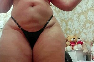 sensual dance in pink shorts showing huge butt shaking it with big ass curves