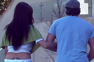 Latina mom performs blowjob in stockings and heels on bed with shaved pussy and anal finger action