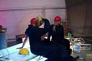 Workers take a break and indulge in a hard threesome where two babes get fucked