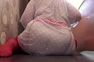 check it out, the camera watches from the side as busty milf fucks with dildo recording video of her gorgeous big tits and hairy pussy