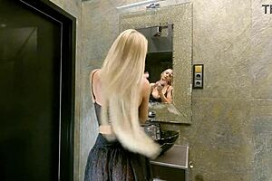 Big Tits Long Haired Sexy Blonde Prepares For The Night In A See Through Mini Skirt With Underknee Socks And No Panties