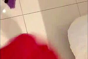 Pegging with strap-on anal using a double-headed dildo in bisexual role play.