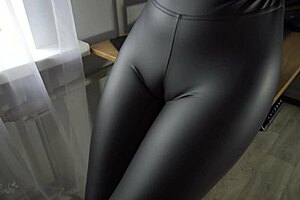 Hot Colleague In LEATHER PANTS Teases Her FAT CAMELTOE