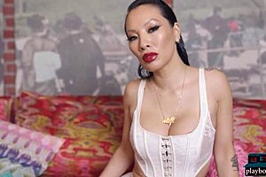 Asian milf Asa Akira strips to reveal big tits and tight naked body in solo scene