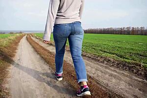 Why Tease with Phat Ass Milf Walking Outdoors in Loose Jeans?