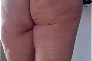 Stepmom tries on micro bikini for beach trip and asks stepson for opinion on videos.