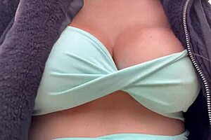 I'm checking out Artemisia Love on the beach with her juicy big natural tits showing