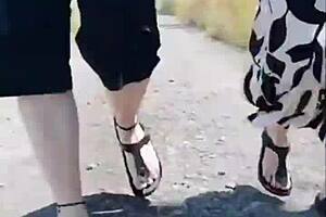 Hot granny's sunny walk