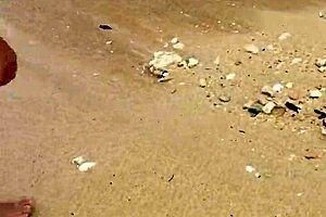 Bold asian wife flaunts big tits nude on beach