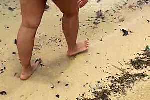 Bold asian wife flaunts big tits nude on beach