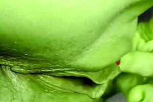 She transforms into She Hulk for homemade Halloween fun. Big green woman shows off green ass green feet and green pussy.