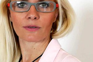 Hey, check out teacher Lilly Peterson with glasses undressing and masturbating in classroom