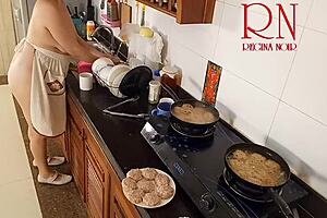 Nudist housewife Regina Noir naked cooking in kitchen
