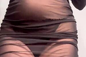 goddess ellie rowyn dances teasing in sheer black dress