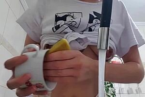 sexy latina maid washes dishes with huge tits bouncing out