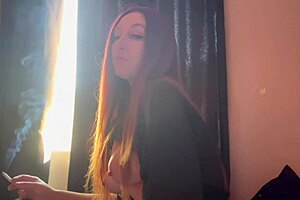 italian milf artemisia flashes big tits while smoking seductively