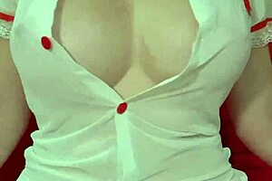 Blonde curvy amateur bounces huge fake tits in see-through dress closeup