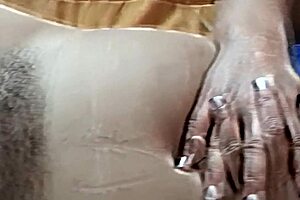 A beautiful latina stepmom flashes her big hairy pussy getting turned on voyeur style at home