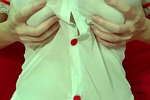 Blonde curvy amateur bounces huge fake tits in see-through dress closeup