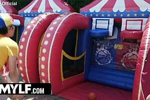 damn that extra tall milf bouncin wild in the bounce house trailer