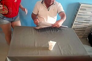 Naked waitress serves food from her navel to guest.