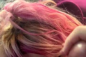 pretty girl kneels in car backseat for a deep oral session outdoors