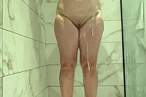 jurels' fat chubby wife spreads shaved pussy and natural tits in hot shower!