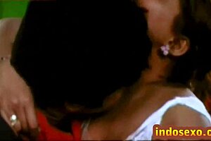 Young guy licks honey off Indian mature woman's big boobs