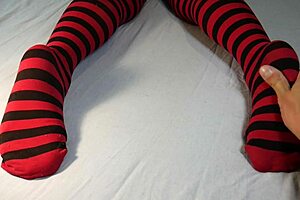 guy massages and tickles her bare soles after stripping off those sexy socks