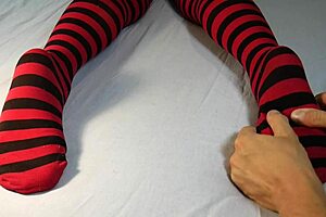 guy massages and tickles her bare soles after stripping off those sexy socks