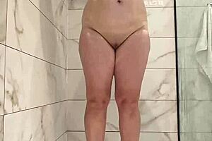 jurels' fat chubby wife spreads shaved pussy and natural tits in hot shower!