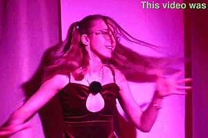 she dances teasing her bare pussy lips waiting for the perfect flash