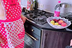 Mature colombian latina's fat ass shakes crazy in kitchen while hubby watches tv!