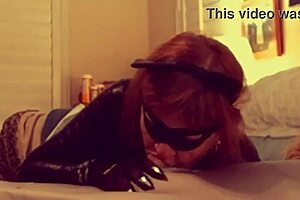 Granny Catwoman in stockings sucks moaning Batman's cock close-up