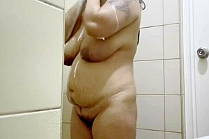 NAUGHTY INDIAN MOM SHOWERING BIG BOOBS HAIRY PUSSY