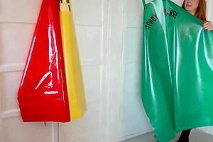 Squirting PVC apron fetish slut fingers shaved pussy to explosion!